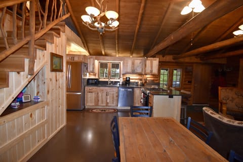 Dining table was the original door to the cabin in the 1940's