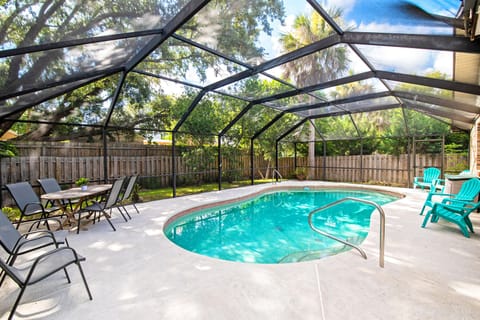 Fully fenced, screened, and private backyard pool