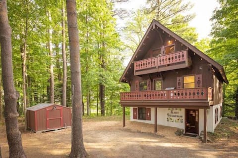 Discover this log cabin nestled in the woods.