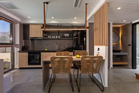 The open plan kitchen-dining area.