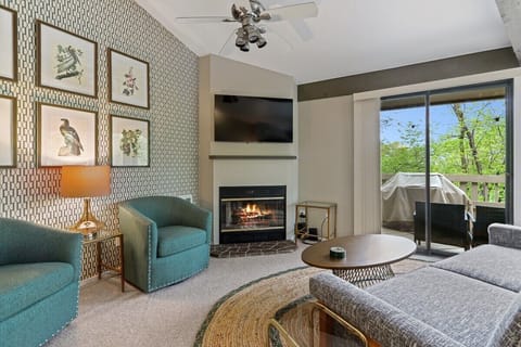 Living room with smart TV and fireplace 
(Grill not included due to restrictions)