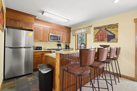 The chef in your group will love this updated kitchen with its granite countertops, stainless steel appliances and bar/serving area with seating for four.