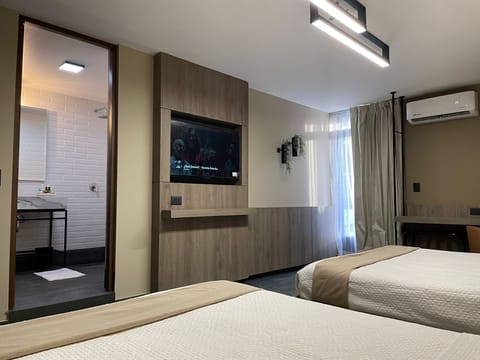 Executive Room | 1 bedroom, premium bedding, down comforters, memory foam beds