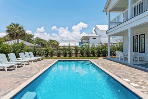 Long rectangular pool w/ clear water & space to swim or float.