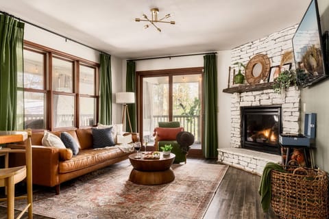 Living Room: Bask in natural light beside the charming fireplace and stylish decor!