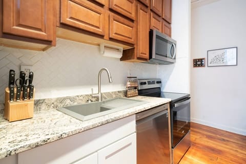 Brand new dishwasher and newly tiled backsplash! 