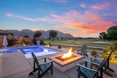 Backyard oasis w/ pool, firepit & glowing sunset views for relaxing evenings outside
