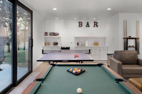 Challenge your crew to a tournament in the detached game room featuring a pool table and ping pong. The dedicated wet bar area makes it easy to keep the snacks and local wine flowing all night long.