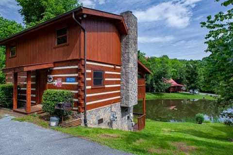 Step into rustic charm. This door opens to a welcoming cabin where warmth and nature await.