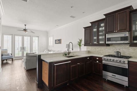 Kitchen bar area overlooking family room