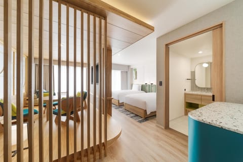 Deluxe Room, 2 Twin Beds | Down comforters, in-room safe, desk, laptop workspace