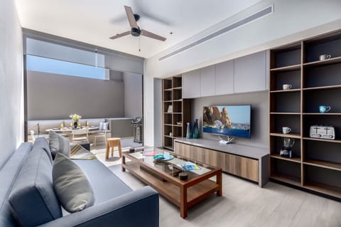 Elegance meets comfort in this La Marina condo's stylish living room.