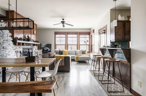Spacious open-concept living with fireplace — perfect for relaxing after skiing
