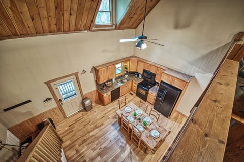 View of the kitchen and dining from the upstairs loft.