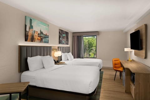 Deluxe Room, 2 Queen Beds, Non Smoking | Desk, soundproofing, iron/ironing board, free cribs/infant beds