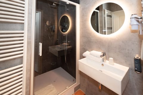 Standard Room | Bathroom | Free toiletries, hair dryer, children's robes, towels