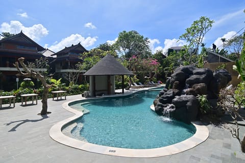 Outdoor pool, open 7:00 AM to 10:00 PM, sun loungers