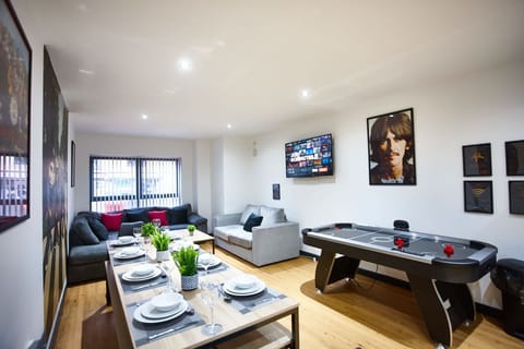 Dinning area with ice hockey table and living area