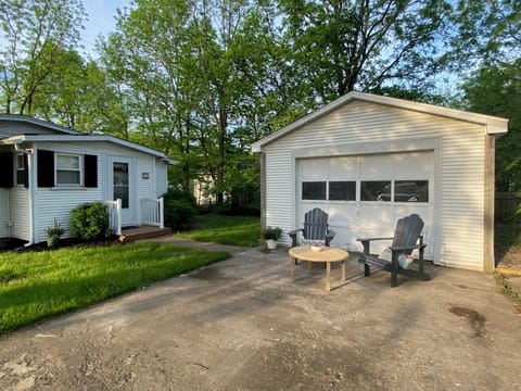 Outdoor furniture-dining table & chairs for outdoor enjoyment located in shed