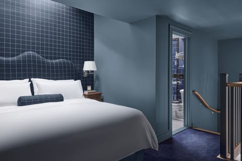 Loft (Mansion Suite) | Minibar, in-room safe, laptop workspace, iron/ironing board