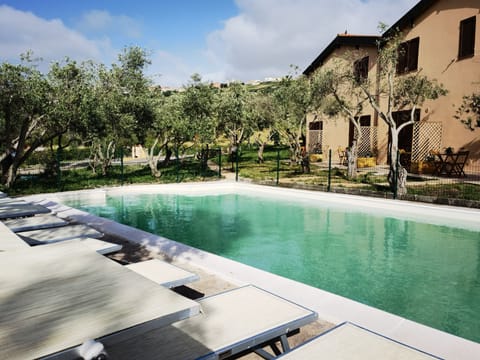 Seasonal outdoor pool, open 8:00 AM to 8:00 PM, sun loungers