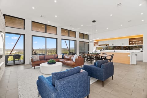 Living, Dining and Kitchen with views of the lake