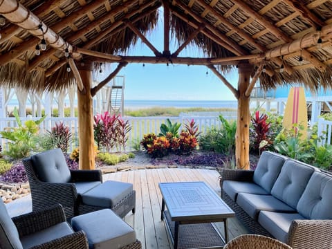 Relax beneath the palapa in the fully fenced backyard.