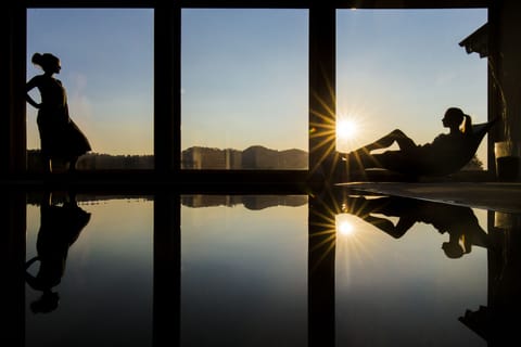Indoor pool, seasonal outdoor pool, pool umbrellas, sun loungers
