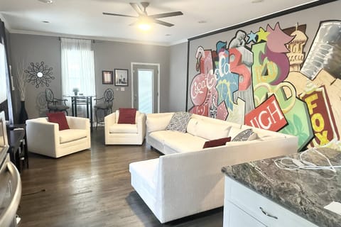 Relax after a long day in the city and admire that wall painting that has everything in it that makes ATL Great!