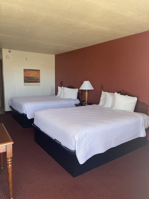 Premium bedding, desk, blackout drapes, iron/ironing board