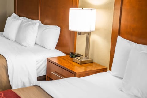 Desk, blackout drapes, iron/ironing board, free cribs/infant beds