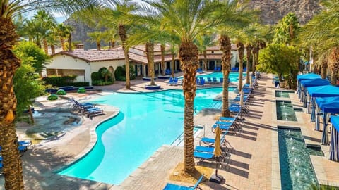 Main Pool, cabanas and kids friendly pool section
