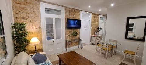 Apartment 9 Lounge Room leading to Kitchen and Bedroom