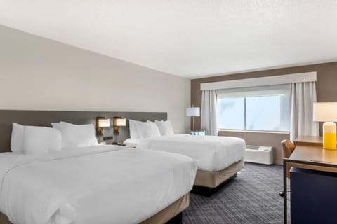 Standard Room, 2 Queen Beds, Non Smoking | Pillowtop beds, desk, laptop workspace, blackout drapes