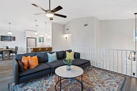 Relax in a bright, modern living room that’s perfect for movie nights or hanging out.