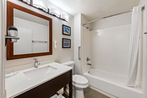 Desk, blackout drapes, iron/ironing board, rollaway beds