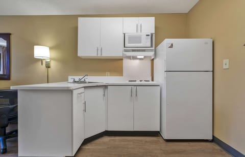 Studio, 1 Queen Bed, Non Smoking | Private kitchen | Full-size fridge, microwave, stovetop, coffee/tea maker