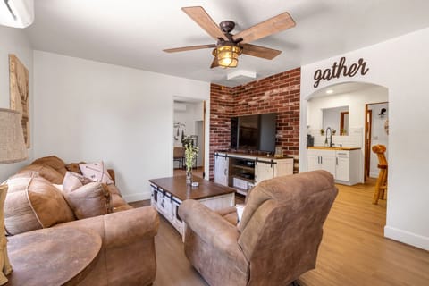 Plenty of seating for time spent together indoors.  Enjoy the large screen tv, ceiling fan and time with family and friends.