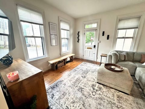 Living room on main floor w/ smart tv