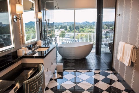Presidential Suite | Bathroom | Designer toiletries, hair dryer, bathrobes, slippers