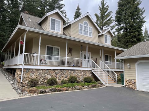 The beautiful cabin offers a relaxing wrap around porch and plenty of parking!