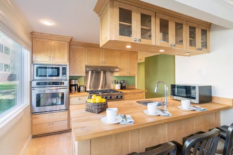The updated kitchen provides all the tools and appliances you need for a relaxing evening of home-cooked meals.
