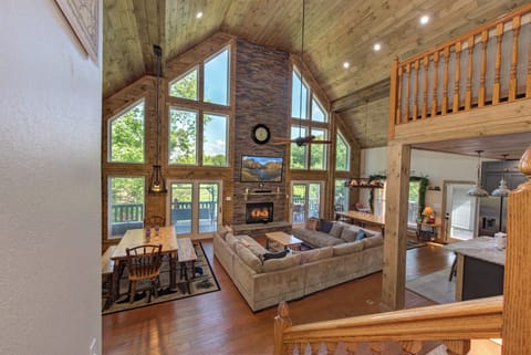Cabin, Multiple Beds, Hot Tub | Living area | 65-inch flat-screen TV with digital channels, TV, fireplace