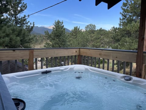 Private hot tub w/ view of Longs Peak and the range. 