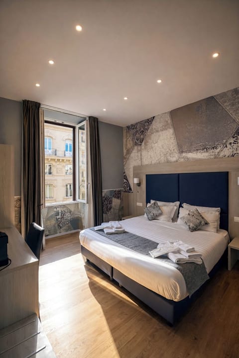 Premium bedding, free minibar, in-room safe, desk