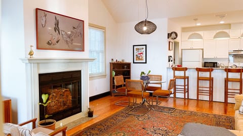 Our fireplace is just for show - we stacked the wood to give a Dwell feel, which is offset by more traditional unpretentious design elements.