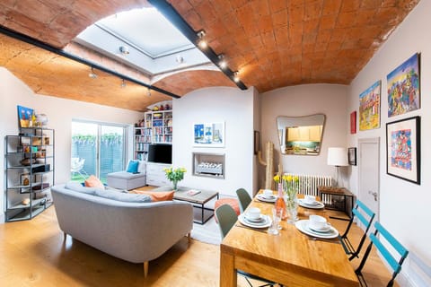 An inviting living room welcomes you to the Hyde Park!