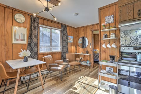 Your view of the open-concept and well-furnished cottage upon entering