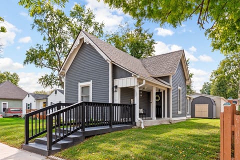 Charming gray home with covered front porch
