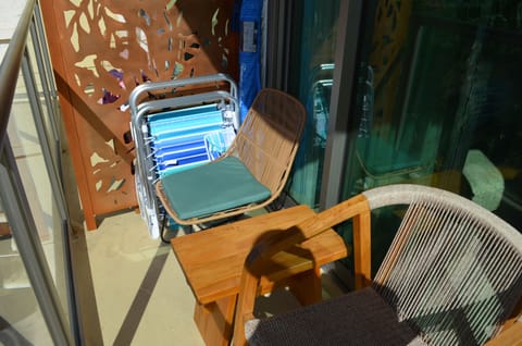 Beach chair and umbrella in lanai